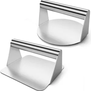 Professional stainless steel burger press and griddle smash tool with ergonomic handle.
