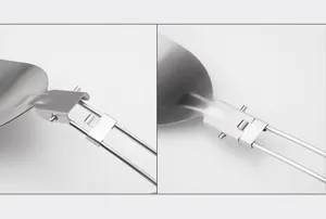 Stainless steel camping folding spatula detail view, compact outdoor portable cookware part.