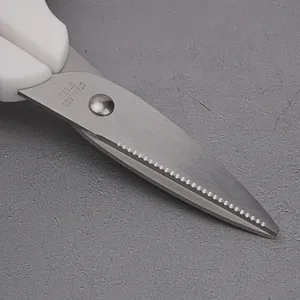 Stainless steel baby food scissors with white handle, mini multi-functional household tool item.