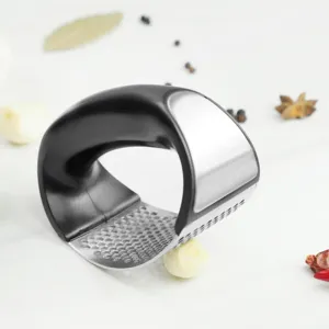 Stainless steel garlic press with black handle, manual kitchen tool for fast garlic mincing.