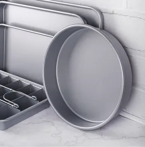Durable 9-inch non-stick round baking pan for delicious cakes, pizza, and pastries.