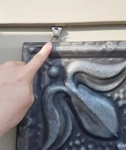 Stainless steel vinyl siding hook, punch-free outdoor wall hanger for home decor.