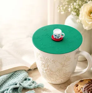 Silicone cup lid with cute mini tea cup handle, universal round cover for ceramic mugs.