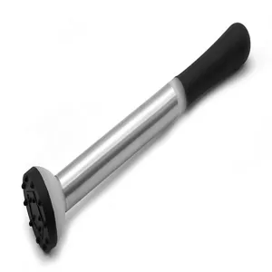 Stainless steel cocktail muddler detail view, textured ice crusher head, ergonomic black handle.