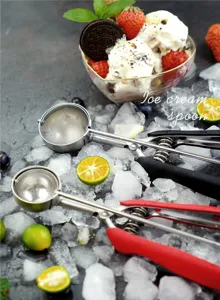 Stainless steel ice cream scoop with trigger and comfortable handle for kitchen use detail view.