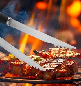 Close-up detail of stainless steel BBQ tongs featuring serrated grip for outdoor camping grilling.