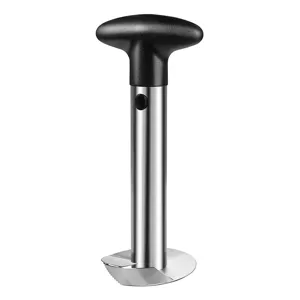 Stainless steel pineapple corer blade detail, ergonomic black handle for easy fruit slicing.