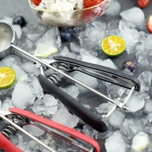 Stainless steel ice cream scoop cookie spoon kitchen tool for home baking and dessert serving.