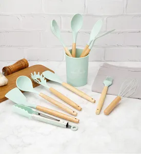 12-piece silicone kitchen utensil set with wooden handles and convenient storage holder.