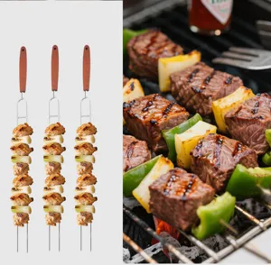 Stainless steel BBQ skewers with wooden handle, dual prong design for grilling meat and vegetables.