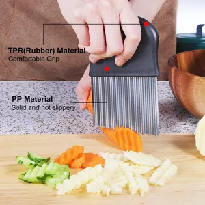 Stainless steel crinkle cutter knife for wavy French fries and kitchen vegetable slicing.