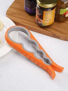 Multi-functional 4-in-1 jar opener detail shot, ergonomic non-slip grip for kitchen use.