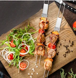 Stainless steel BBQ skewers set for outdoor grilling, durable metal shish kabob sticks.