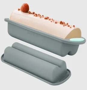 Silicone loaf baking pan detail showing gray mold and dessert insert for kitchen baking use.