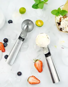 Stainless steel ice cream scoop with trigger release, perfect for dessert serving and baking.
