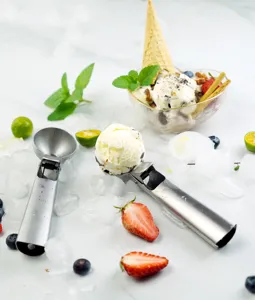 Stainless steel ice cream scoop with trigger, 7-inch metal dessert ball maker detail.