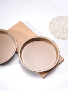 Round gold non-stick pizza baking pan cake mold kitchenware set for home baking use.