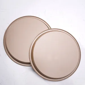 Gold round non-stick pizza baking pan set, durable kitchen bakeware for home cooking.