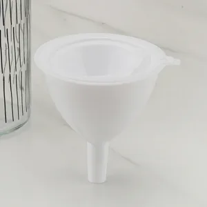 White plastic funnel set for kitchen use, portable nested liquid funnels for oil and wine.