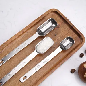 Stainless steel measuring spoons set, square metal spoons with clear capacity scale on wooden tray