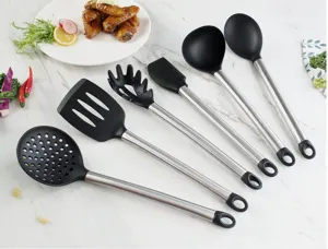 Silicone kitchen utensils detail view showing heat-resistant silicone heads and stainless steel handles.