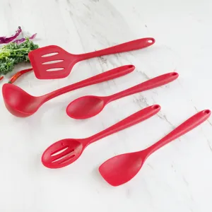 5-piece red silicone kitchen utensil set with spatula, soup ladle, and spoons for cooking.
