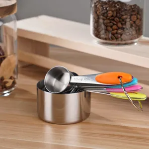 Stainless steel measuring cups and spoons set with colorful handles for baking and cooking.