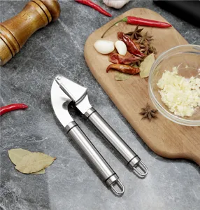 Stainless steel garlic press detail showing robust metal construction and kitchen scene setup.