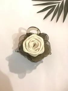 Chiffon rose hair claw clip detail, elegant floral hair accessory for women half updo styling.