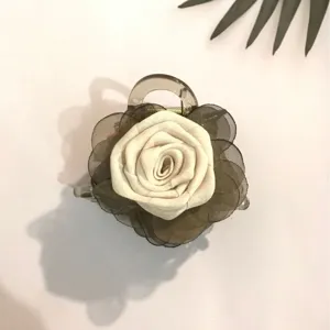 Organza rose flower hair claw clip, elegant medium hair accessory for women half-up styling.