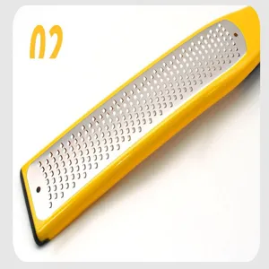 Stainless steel cheese grater lemon zester with bright yellow handle for kitchen use.