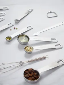 Stainless steel measuring spoons set for precise baking and kitchen seasoning tool details