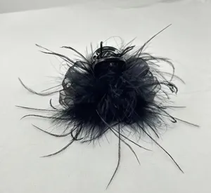 Black feather hair claw clip elegant fashion hair accessory for women styling detail