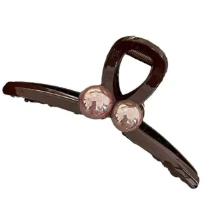 Große braune Haarklammer mit glänzenden runden Perlen, elegantes Haarschmuck-Accessoire.