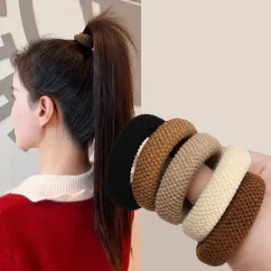 Close-up detail view of thick high elasticity hair ties scrunchies for durable everyday wear.