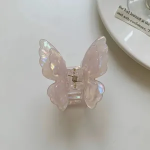 Exquisite iridescent butterfly hair claw clip with glossy finish for elegant daily styling.