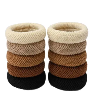 Set of thick knitted hair scrunchies with high elasticity, assorted neutral colors for women.