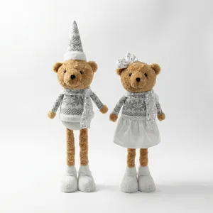 Close-up details of Christmas telescopic teddy bear plush doll ornaments in cozy winter sweaters.
