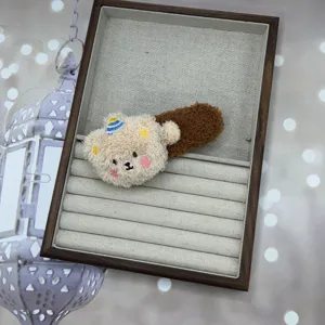Fluffy plush bear duckbill hair clip for women, cute winter sweet hairpin accessory.
