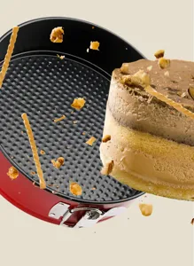 Non-stick 10-inch red carbon steel springform cake pan with honeycomb texture for baking.