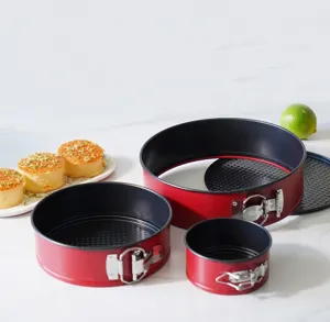 Carbon steel springform cake pan set with non-stick coating and removable bottom for baking.