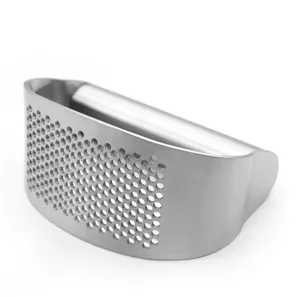 Stainless steel garlic press detail view showing perforated arc base and ergonomic handle.