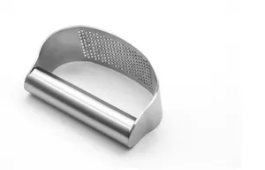 Stainless steel manual garlic press rocker, compact kitchen tool for mincing ginger and garlic.