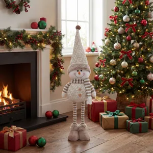 Christmas plush snowman figure with telescopic legs and knitted hat for holiday decoration.