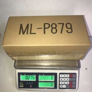 Detailed view of product packaging box placed on an electronic scale for weight checking.