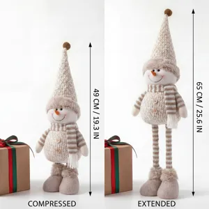 Christmas retractable snowman doll plush decoration with knitted hat and striped scarf.