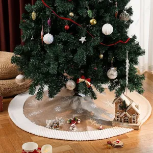 Burlap Christmas tree skirt with white plush trim and snowflake pattern for holiday decor.
