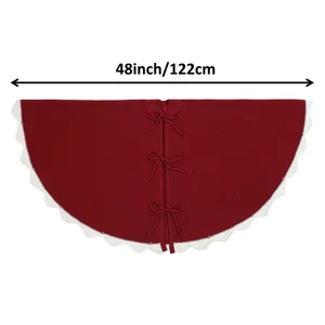 Red knitted Christmas tree skirt 48 inch with white scalloped edge for holiday decor.