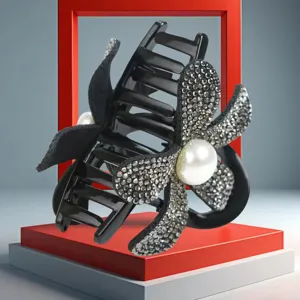 Elegant rhinestone flower hair claw clip with large faux pearl, perfect for chic half updos and ponytails.