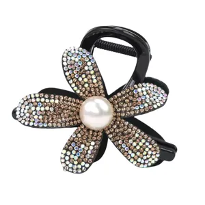 Shiny rhinestone flower hair claw clip with faux pearl center, elegant black shark hair accessory.